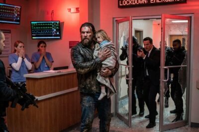 The ER froze when a fearsome biker burst through the doors, begging for help while carrying a dying child. But when her DNA was tested, the system collapsed—and the FBI sealed the hospital after discovering the girl officially did not exist.